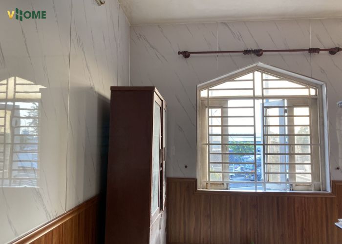 Kết hợp tấm ốp tường nano vân đá và vân gỗ trong phòng ngủ