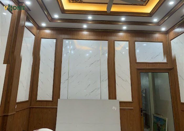 Tấm ốp nano vân đá được sử dụng như vật liệu trang trí tường phòng khách