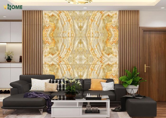 Ốp vách phòng khách bằng tấm PVC vân đá